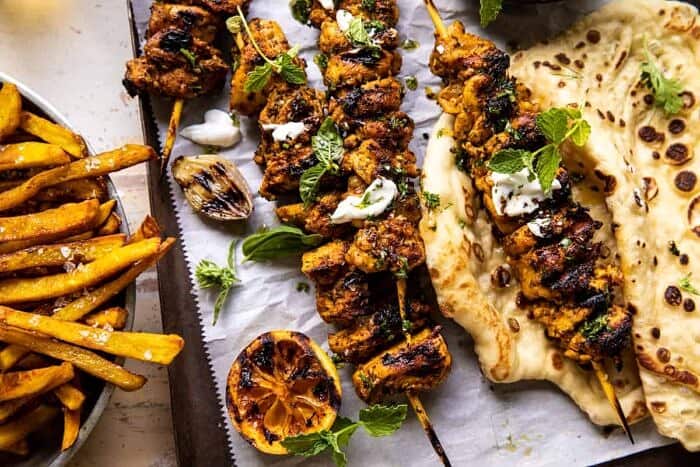 overhead horizontal photo of Grilled Chicken Shawarma with Golden Butter Fries and Garlic Sauce 