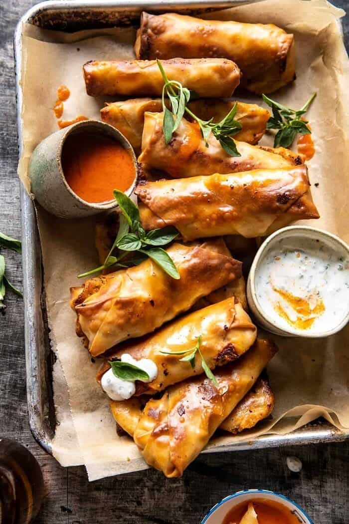 overhead photo of Baked Buffalo Chicken Egg Rolls with Cilantro Lime Ranch
