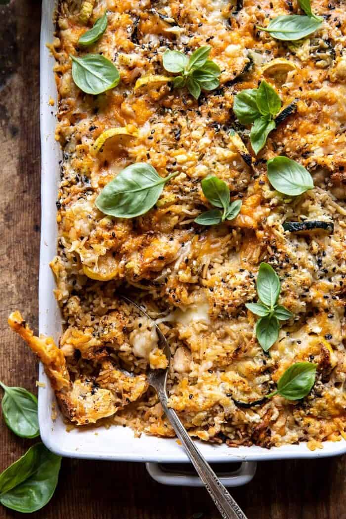 overhead close up photo of Cheesy Zucchini Chicken and Rice Bake