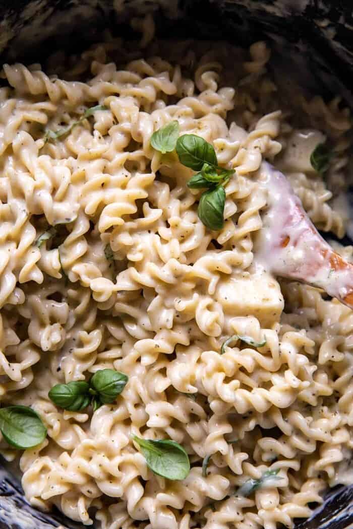 overhead prep photo of One Pot 4 Cheese Caprese Mac and Cheese in pot before baking