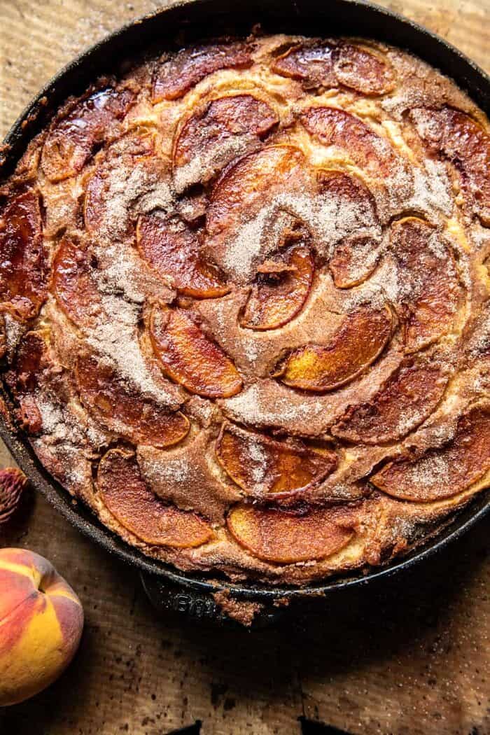overhead photo of Skillet Cinnamon Sugar Peach Upside Down Cake in skillet 