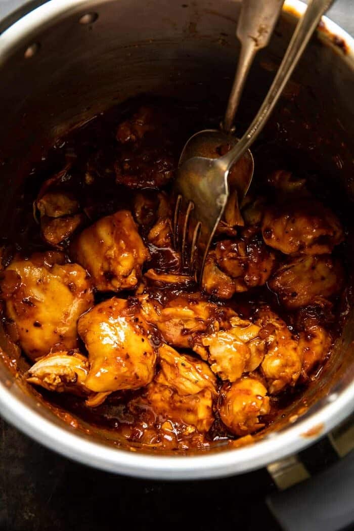 overhead photo of Crockpot BBQ Beer Chicken in crockpot bowl