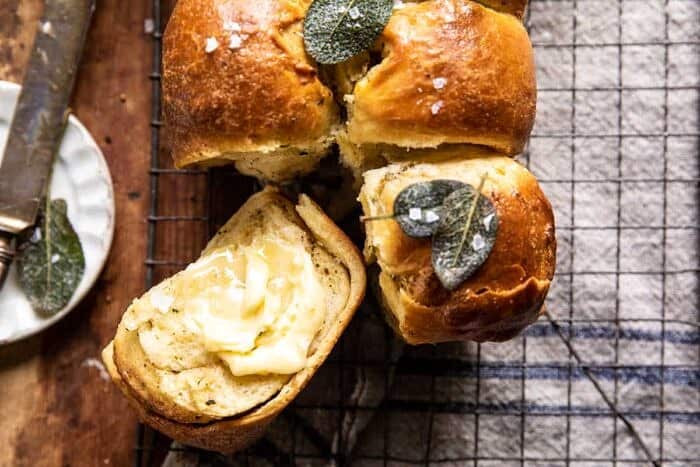 overhead horizontal photo of Pull Apart Parmesan Sage Butter Brioche Rolls