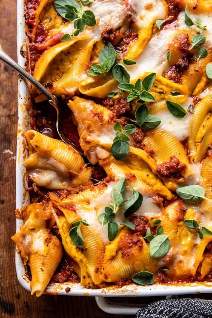 overhead close up photo of Pumpkin Cheese Stuffed Pasta Bolognese Bake