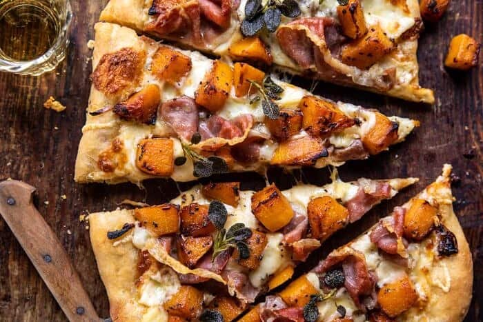 overhead close up photo of Roasted Butternut Squash Prosciutto Pizza with Caramelized Onions 
