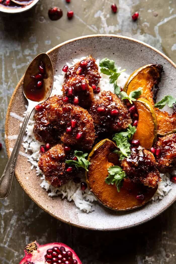 overhead photo of Sheet Pan Sticky Thai Pomegranate Chicken and Honey Roasted Squash