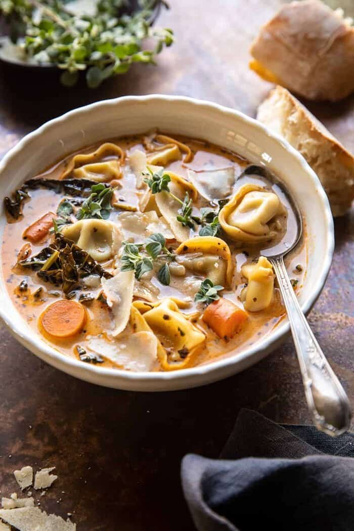 side angled photo of Healthier Slow Cooker Creamy Tortellini Vegetable Soup 