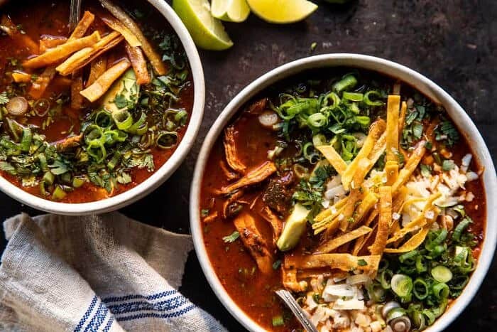 overhead photo of Slow Cooker Chipotle Chicken Tortilla Soup with Salty Lime Chips