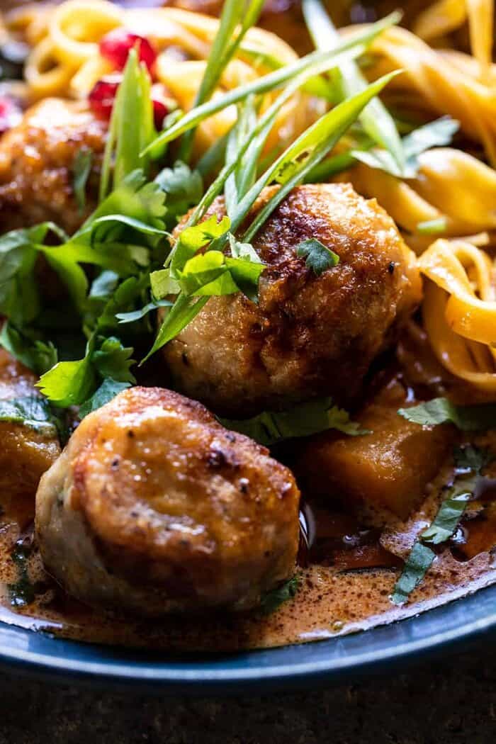 side angled close Creamy Coconut Chicken Meatball and Noodle Curry