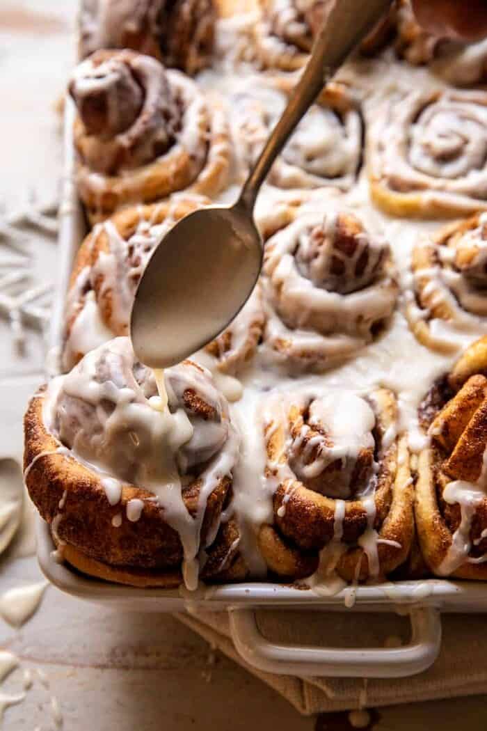side angled photo of Easy Fluffy Eggnog Cinnamon Rolls