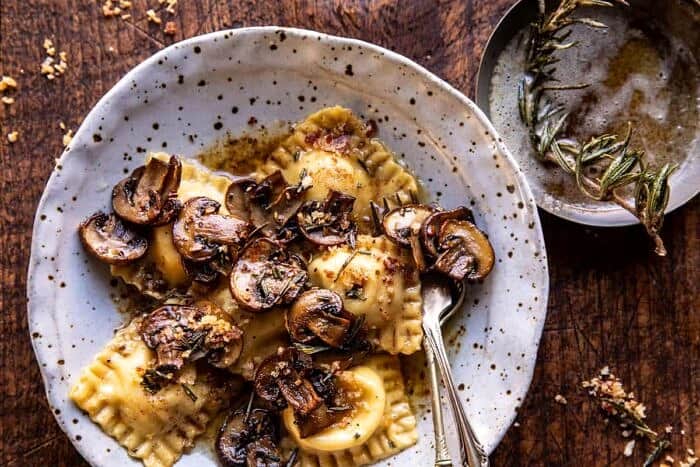 overhead horizontal photo of Rosemary Butter Mushroom and Cheese Ravioli 