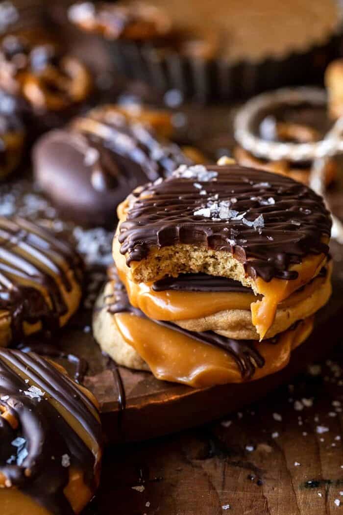side angled photo of Slice n’ Bake Bourbon Caramel Pretzel Cookies with a bite taken out of cookie