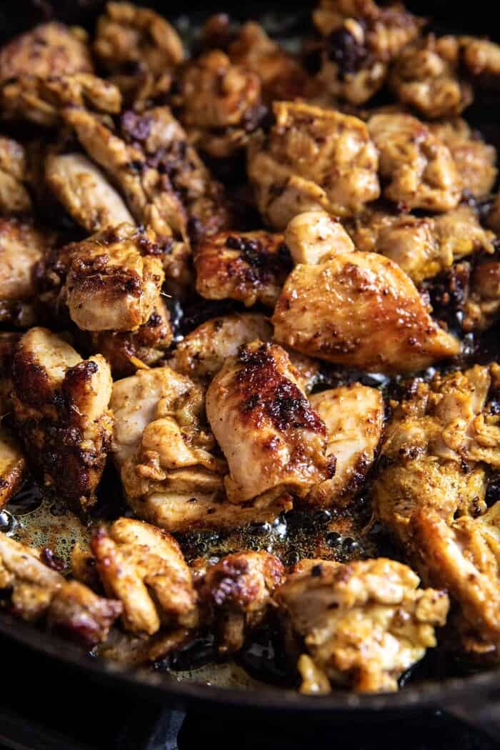 chicken searing in skillet 