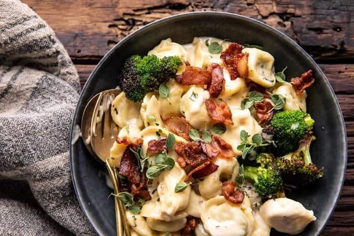 overhead horizontal photo of Creamy Bacon Tortellini with Charred Broccoli 