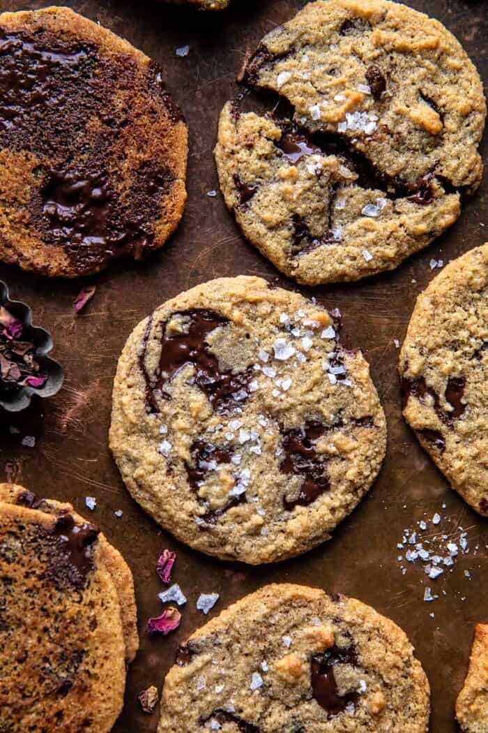 overhead close up photo of Salted Tahini Butter Chocolate Chip Cookies