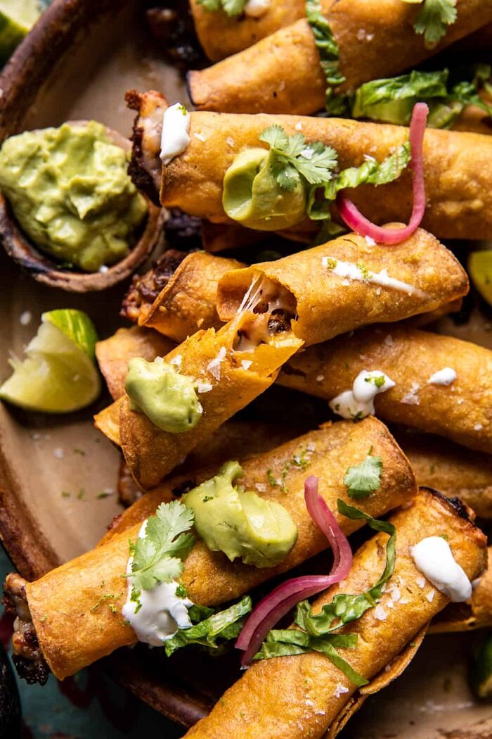 close up photo of Queso Fundido Taquitos=