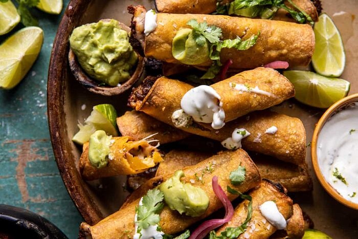 overhead horizontal photo Queso Fundido Taquitos 