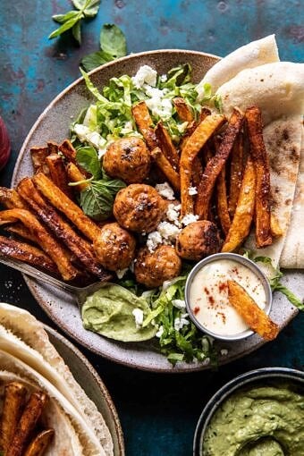 Chicken Meatball Pita Bowls with Seasoned Fries and Feta | halfbakedharvest.com