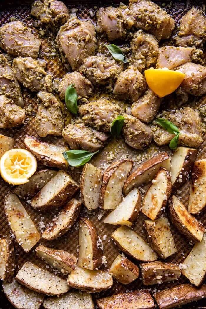 overhead photo of Sheet Pan Pesto Chicken and Lemon Butter Potatoes before baking 