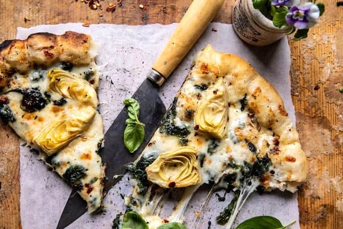 Spinach and Artichoke Pizza with Cheesy Bread Crust | halfbakedharvest.com