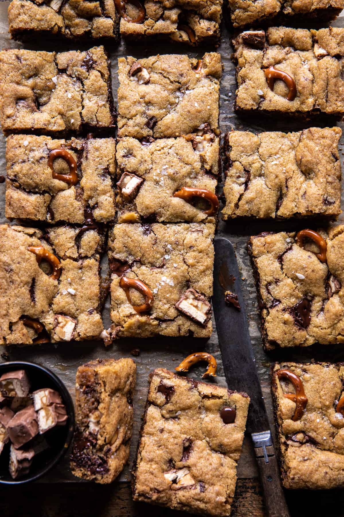 Pretzel Snickers Chocolate Chip Cookie Bars | halfbakedharvest.com