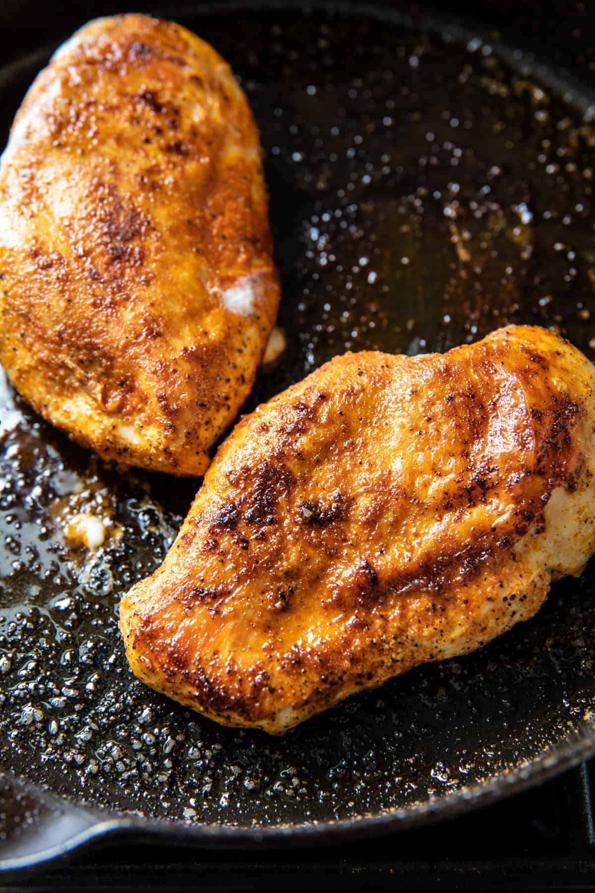 chicken cooking in skillet