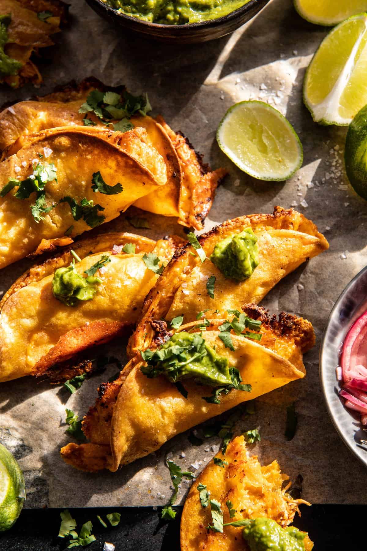 Crockpot Crispy Chicken Tinga Tacos with Avocado Jalapeño Crema | halfbakedharvest.com