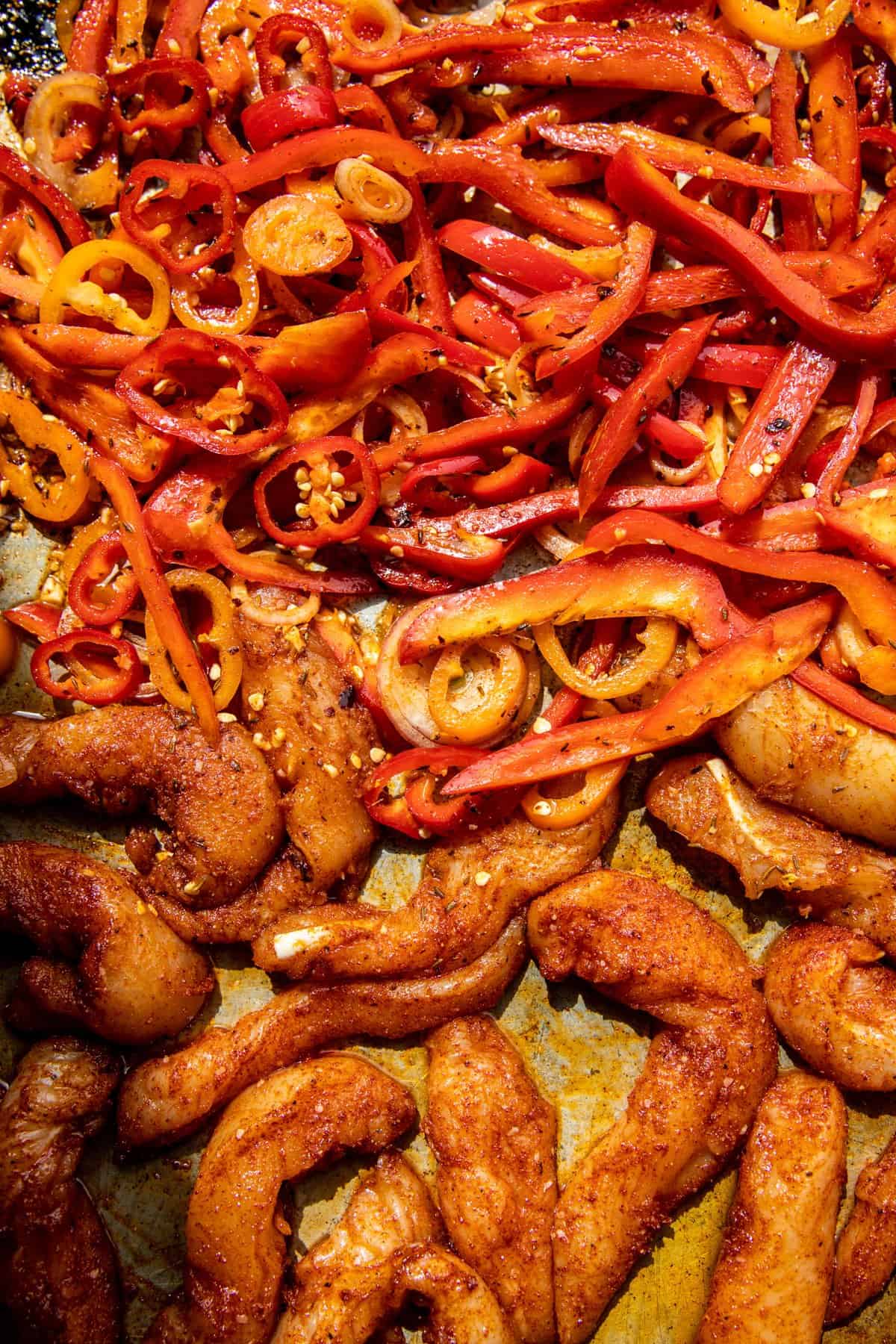 prep photo of chicken and peppers before roasting 