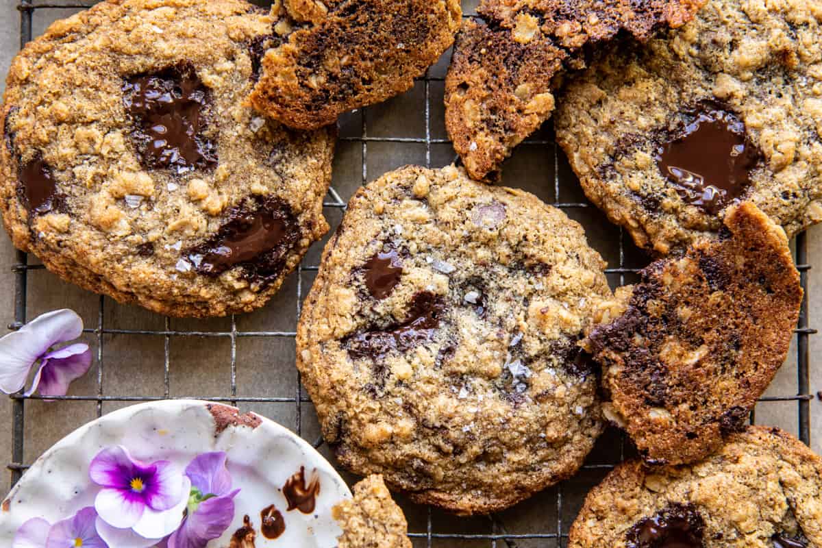 Giant Chewy Oatmeal Chocolate Chip Cookies on cookie sheet with flowers and cookies
