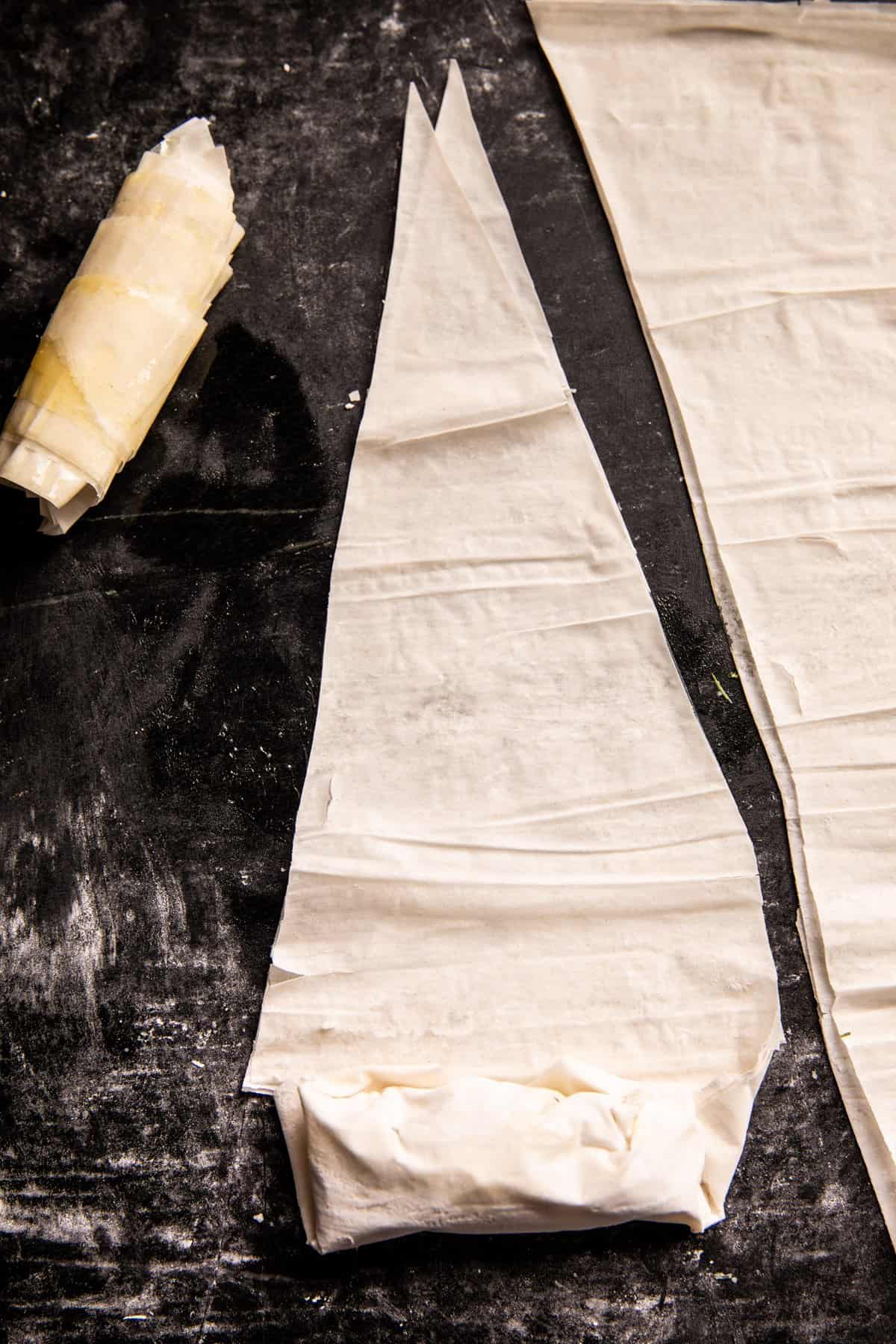 process photo of assembling/rolling the rolls 