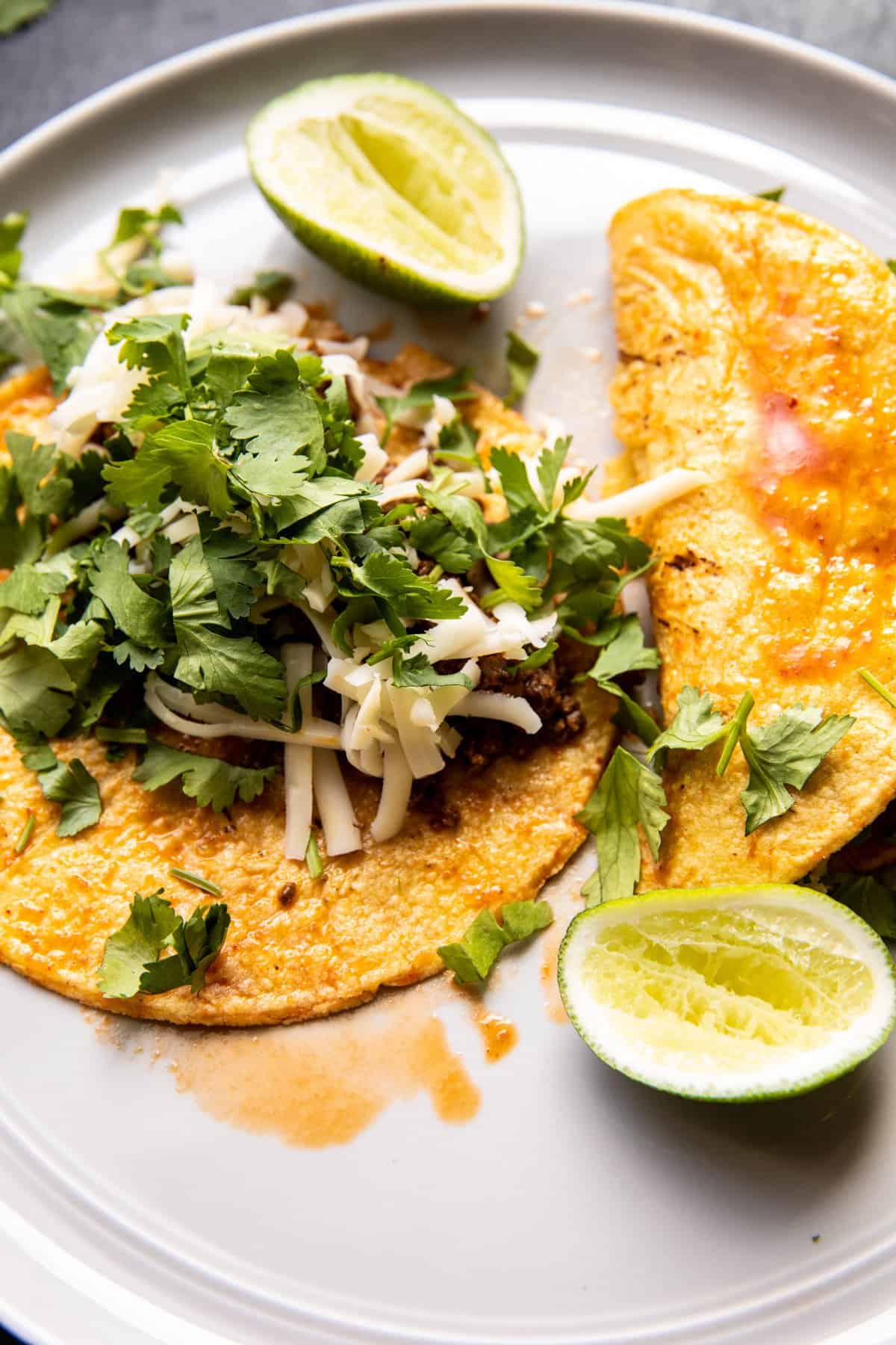 Crispy Cheese Chicken Tacos with Avocado Cilantro Sauce | halfbakedharvest.com