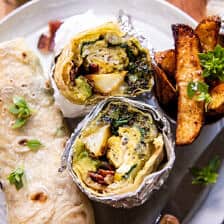 Cheesy Pesto Avocado Bacon Breakfast Burrito | halfbakedharvest.com