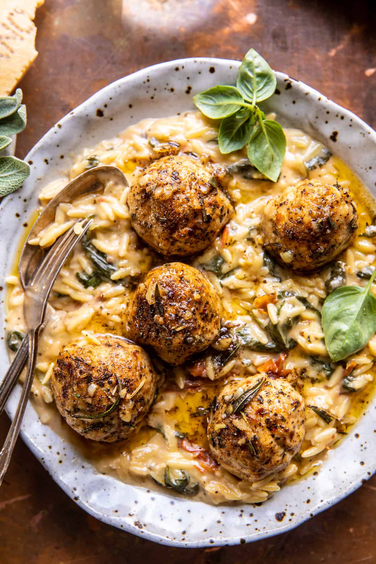 Crockpot Garlic Butter Chicken Meatballs with Creamy Orzo | halfbakedharvest.com