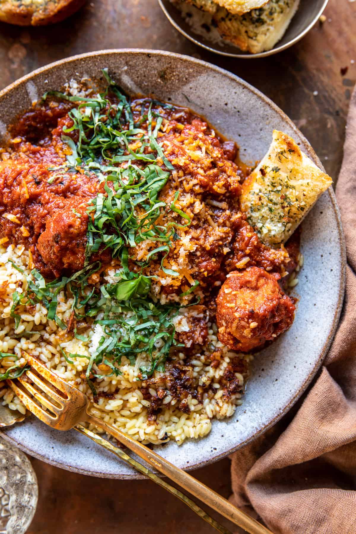 Saucy Braised Garlic Butter Meatballs with Orzo | halfbakedharvest.com