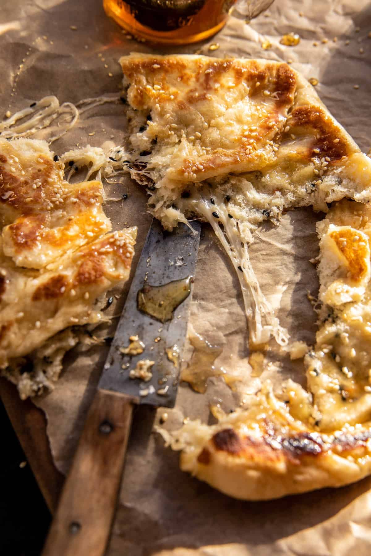 Sesame Gouda Stuffed Naan with Honey | halfbakedharvest.com