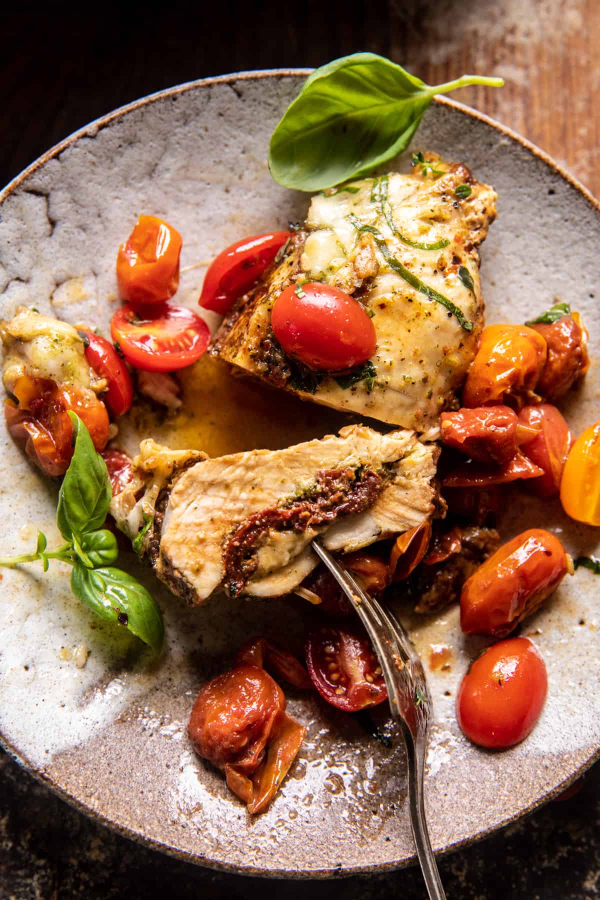 Cheesy Tomato Basil Stuffed Chicken | halfbakedharvest.com