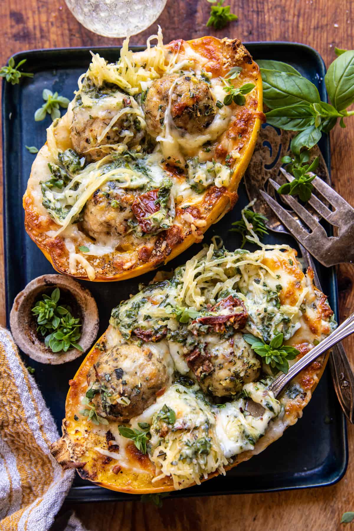 Garlic Butter Chicken Meatball Stuffed Spaghetti Squash | halfbakedharvest.com
