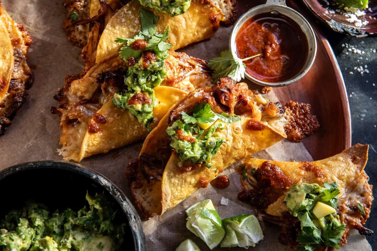 Crispy Carnitas Tacos with Roasted Jalapeño Lime Avocado | halfbakedharvest.com