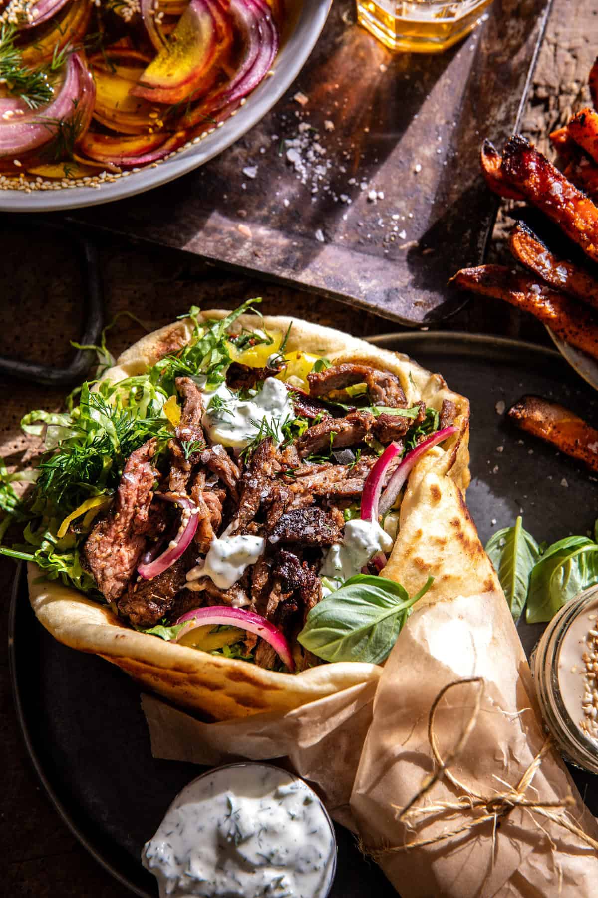 Sheet Pan Steak Gyros with Feta Tzatziki Sauce | halfbakedharvest.com