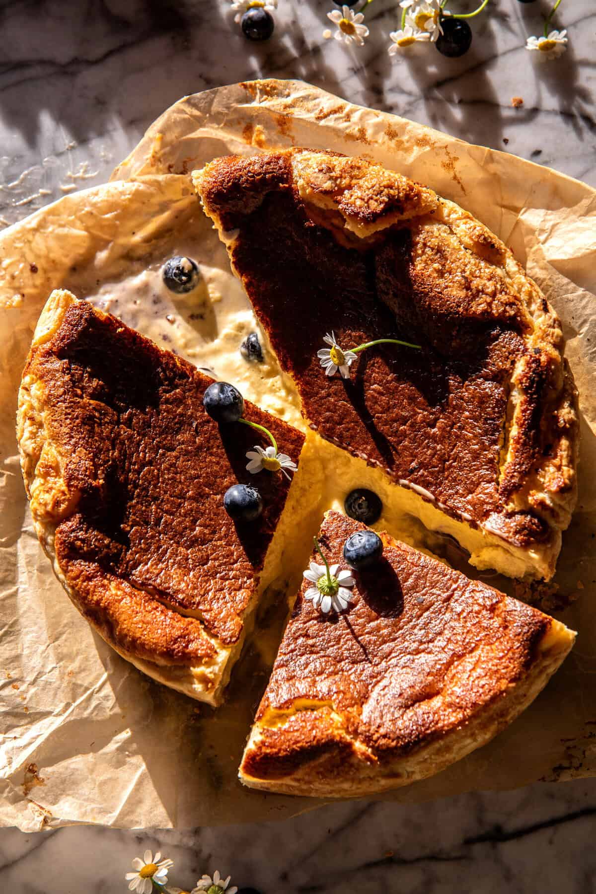 Custardy Burnt Basque Blueberry Cheesecake | halfbakedharvest.com