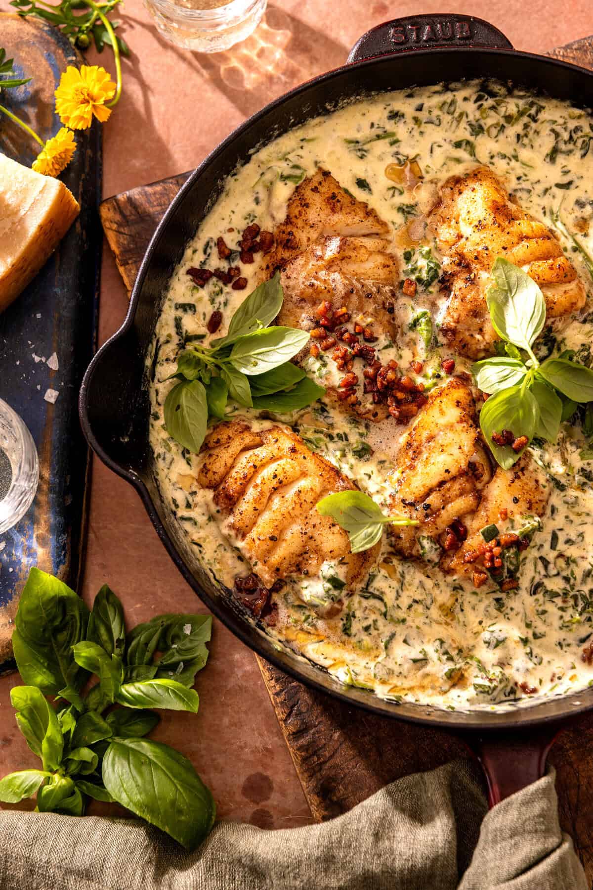 Garlic Butter Cod Florentine with White Wine Cream Sauce | halfbakedharvest.com